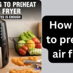 Article cover page with bold text 'How Long to Preheat Air Fryer' in impact font, creative labels, subtitle on optimal preheating time, and a kitchen scene featuring an air fryer, ingredients, and utensils.