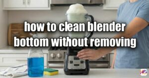 Person running water into a clear pitcher to show how to clean blender bottom without removing the blade assembly.