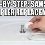 A hand placing a new white plastic Samsung microwave coupler onto the D-shaped motor shaft inside a clean microwave oven floor.