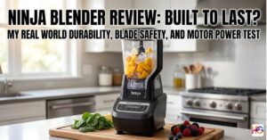 A Ninja Professional Plus blender on a kitchen counter with frozen fruit and spinach. Bold text reads: Ninja Blender Review: Built to Last?