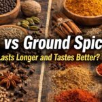 Side-by-side view of whole spices and ground spices with bold Impact font text reading “Whole vs Ground Spices: Which Lasts Longer and Tastes Better?”