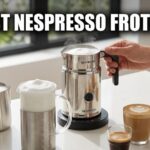 A person uses various coffee tools like a handheld wand and a steel Nespresso electric jug on a white kitchen counter with the text Best nespresso frother.