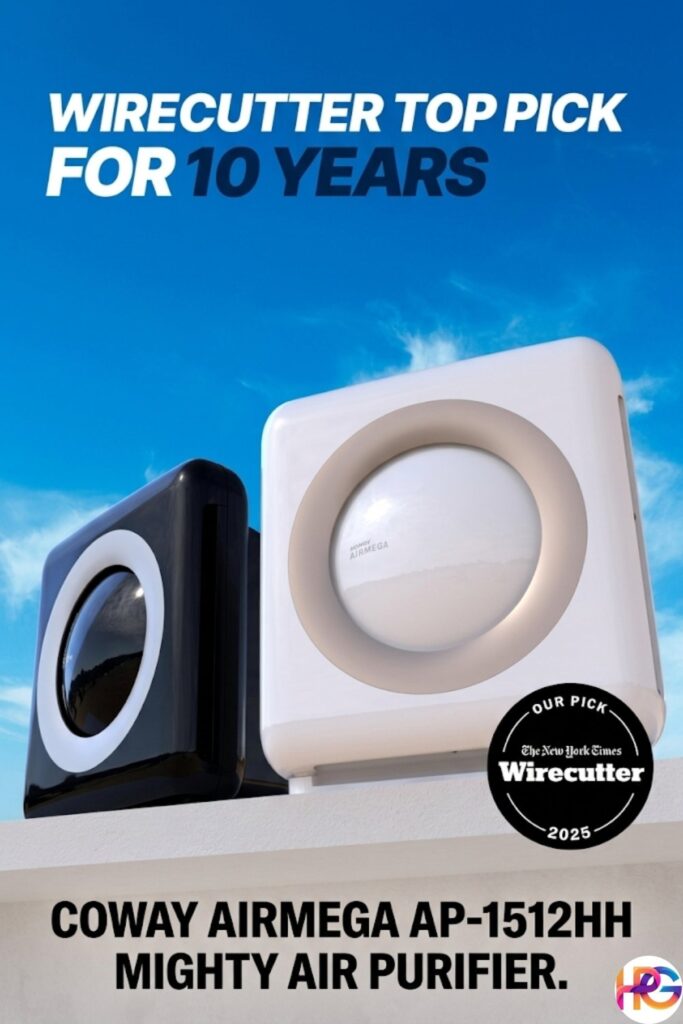 A blue cylindrical Levoit Core 300 air purifier sits on a grey nightstand next to a mint-green retro-style alarm clock and a blue pillow.