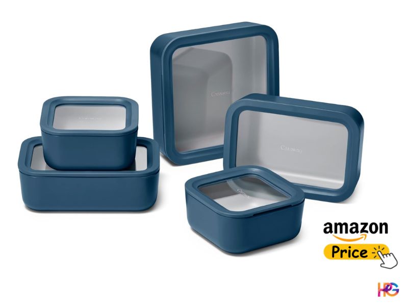 A 5-piece set of navy blue, ceramic-coated glass food storage containers of various square and rectangular sizes stacked neatly on a white backdrop.