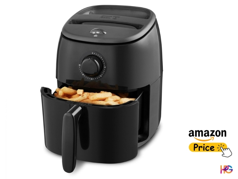 A combination product graphic for the compact black Dash Tasti-Crisp air fryer. The image is the small black air fryer with its basket open and filled with French fries. Beside it, an interactive graphic button includes the "amazon" logo, a yellow button labeled "Price," and a hand-cursor pointer graphic clicking it. A small "HPG" watermark logo is in the corner.