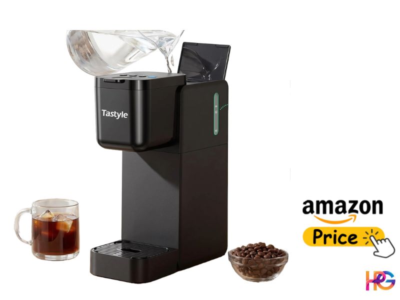 A vertical infographic showing the black Tastyle single-serve coffee maker. A hand pours water from a clear glass pitcher into the open reservoir lid. Nearby are a glass of iced coffee, a bowl of coffee beans, and an interactive 'Amazon Price' button.