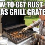 An American woman in work gloves scrubs rusty metal grates on an open gas grill on an outdoor wooden deck.