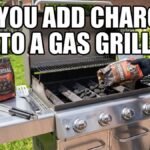 A person pouring charcoal briquettes into a stainless steel gas grill with text reading can you add charcoal to a gas grill.