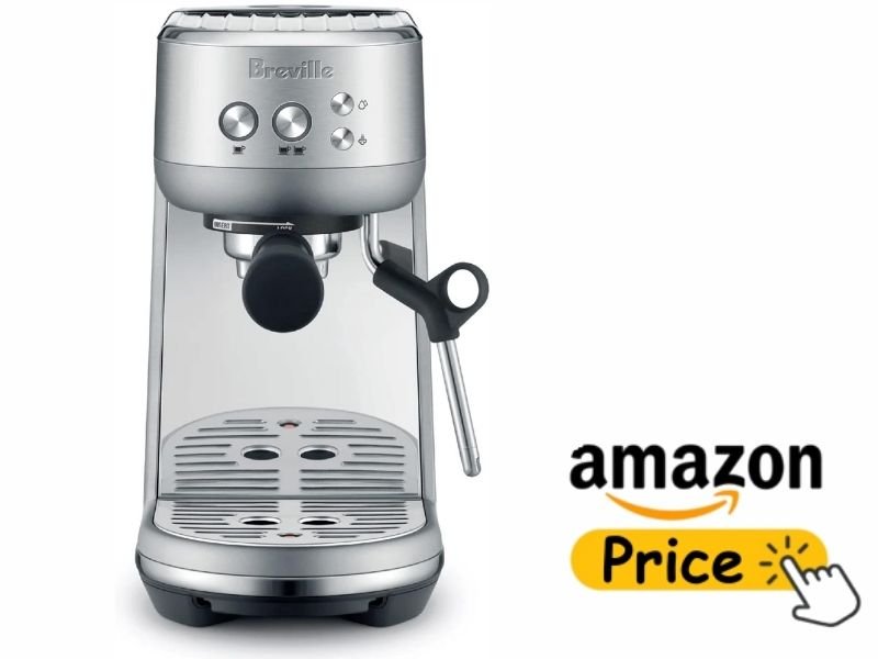 Front view of a brushed stainless steel Breville Bambino espresso machine with a manual steam wand and drip tray against a white background.