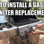 A man replacing a gas grill igniter module on a stainless steel barbecue control panel in a backyard setting.