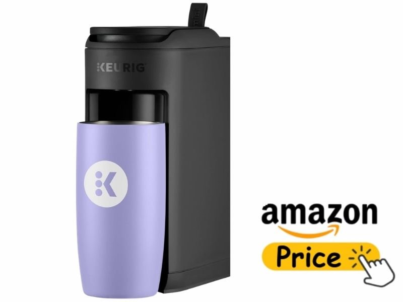 Side view of the Keurig K-Mini Mate Single-Serve K-Cup Pod Coffee Maker with a lavender travel mug and an Amazon Price button on a white background.