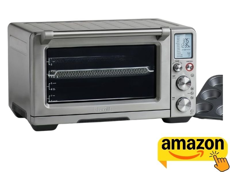 Stainless steel Breville Smart Oven Air Fryer Pro with LCD screen, control knobs, wire rack, and muffin pan.