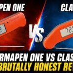 Thermapen One vs Classic comparison showing two orange instant-read thermometers with a VS graphic and review title.