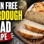 Sliced freshly baked gluten-free sourdough bread loaf on a wooden board next to bold text reading "Gluten Free Sourdough Bread Recipe".
